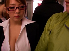 Busty Japanese Babe In Glasses Giving A Tit Job In Public